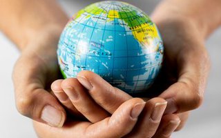 person-holding-earth-globe_23-2148748639.jpg